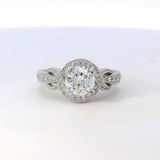 Previously Loved Round Natural Diamond Halo Twist Engagement Ring