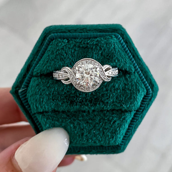 Previously Loved Round Natural Diamond Halo Twist Engagement Ring