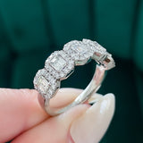 Previously Loved Emerald Cut Diamond Halo Anniversary Half Eternity Band