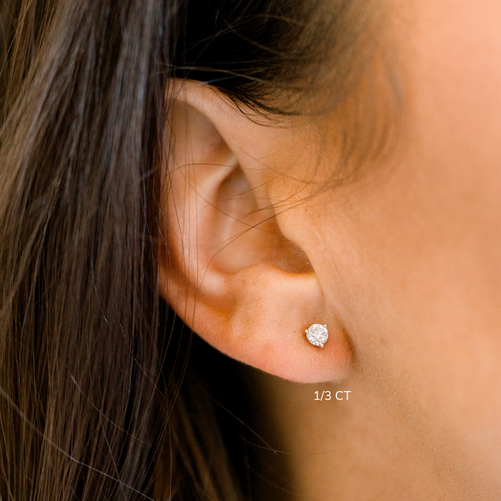 
                  
                    Natural Diamond Stud Earrings
                  
                