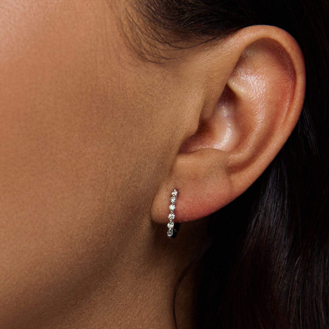 Essential Shared Prong Huggie Hoop Earrings, 0.20 CTTW - Carter's Collective Fine Jewelry