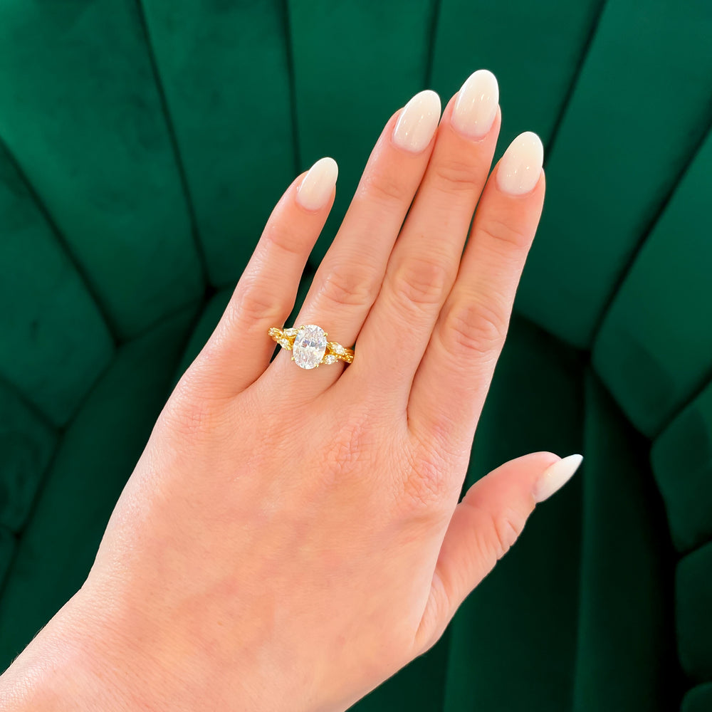 
                  
                    Vine-Inspired Marquise and Round Accent Diamond Band with Diamond Underhalo Oval Engagement Ring Setting (Does Not Include Center Stone)
                  
                