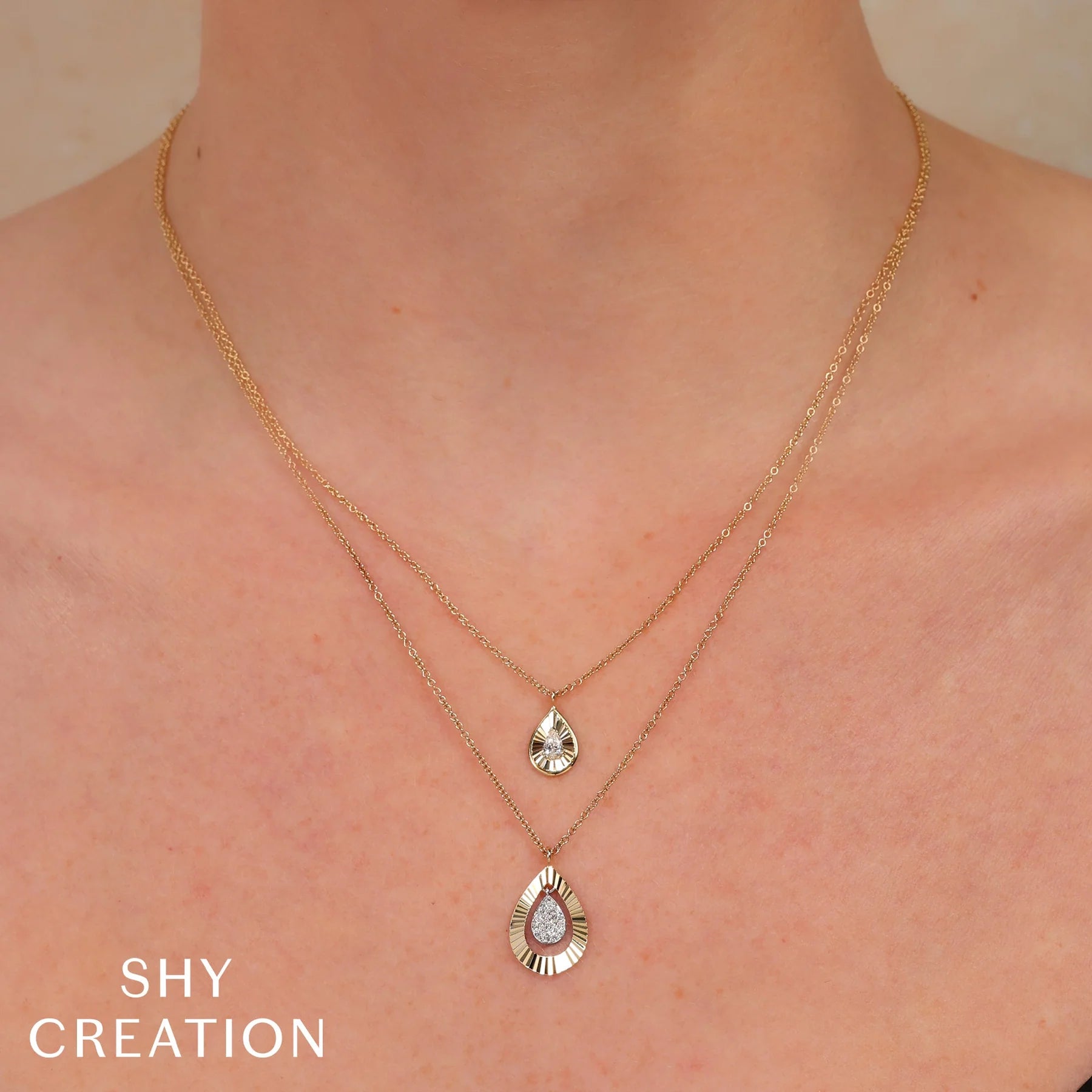 Diamond Pear Fluted Gold Halo Pendant Necklace - Carter's Collective Fine Jewelry