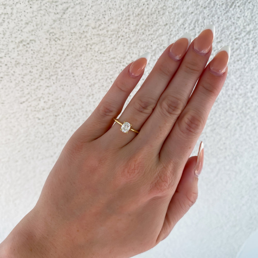 
                  
                    Dahlia Natural Oval Cut Diamond Solitaire Engagement Ring, 0.78 CTTW - Carter's Collective Fine Jewelry
                  
                