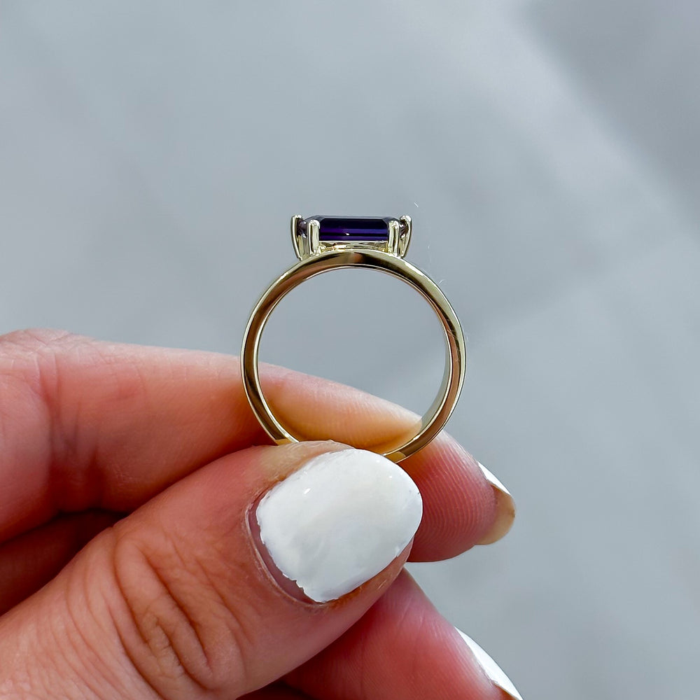 
                  
                    Trapezoid Amethyst Gemstone Offset Cigar Band Ring
                  
                