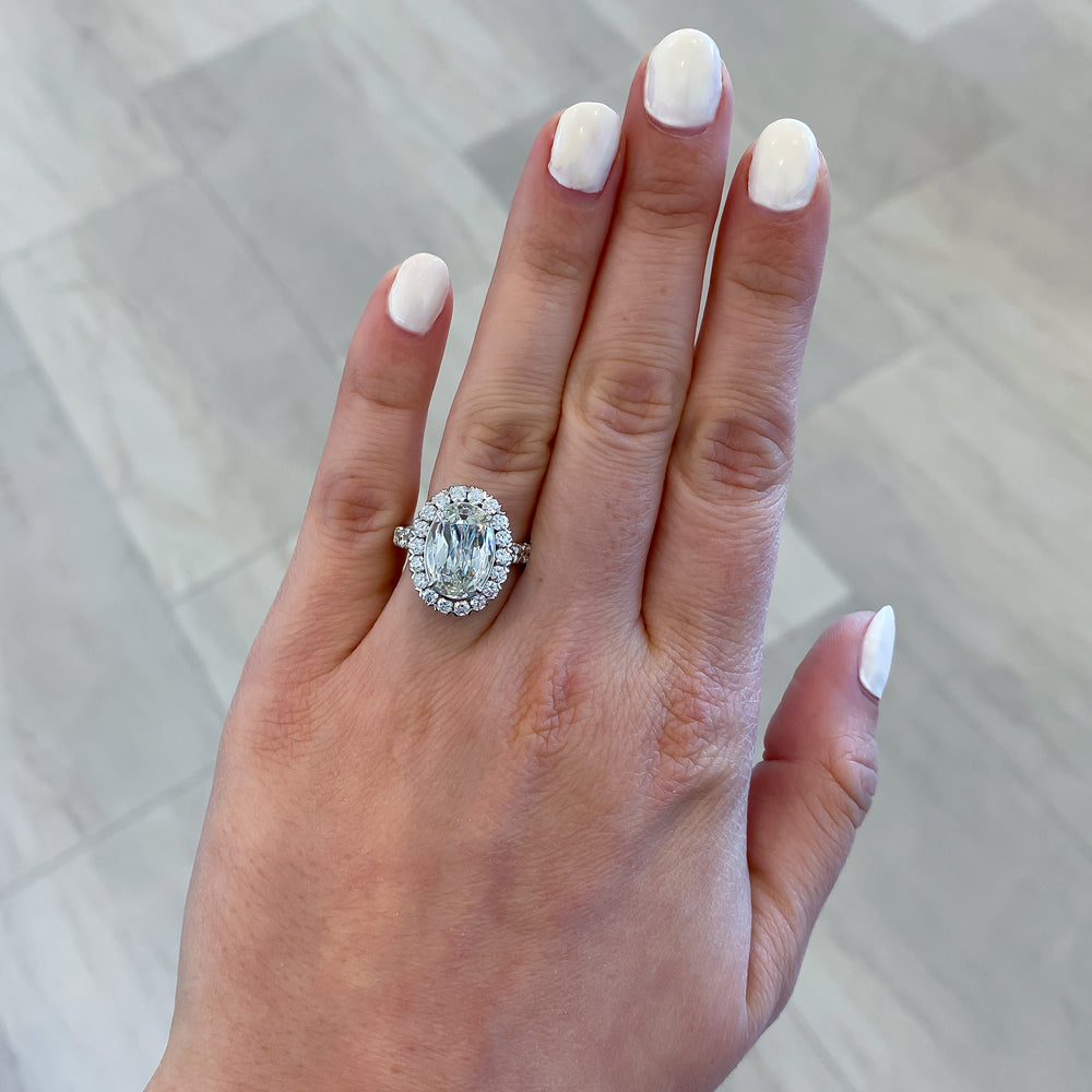 
                  
                    Christopher Designs Crisscut Oval Diamond Halo Engagement Ring
                  
                