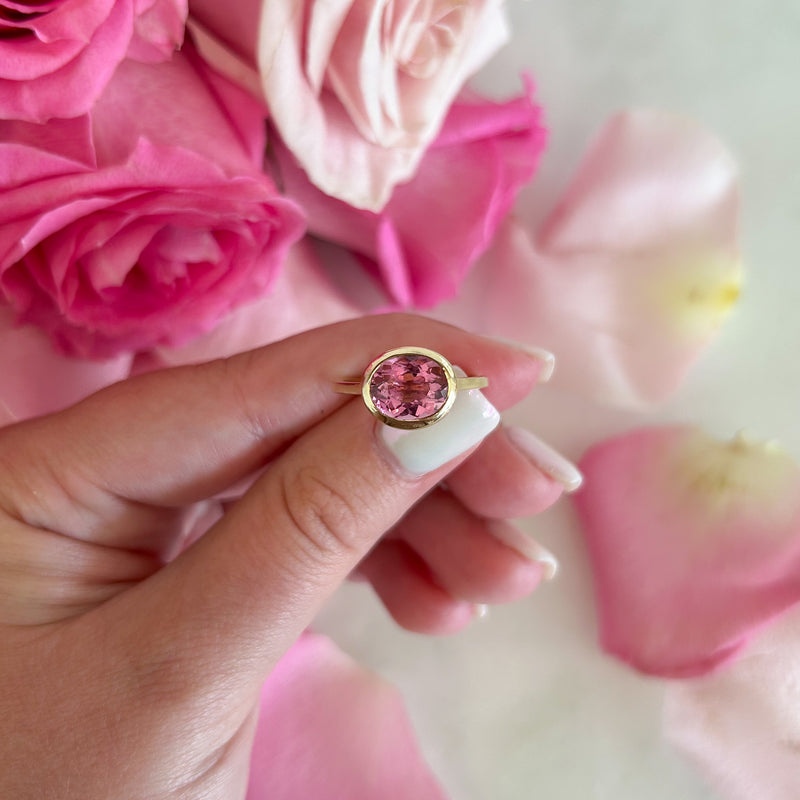 East to West Oval Pink Tourmaline Bezel Set Ring