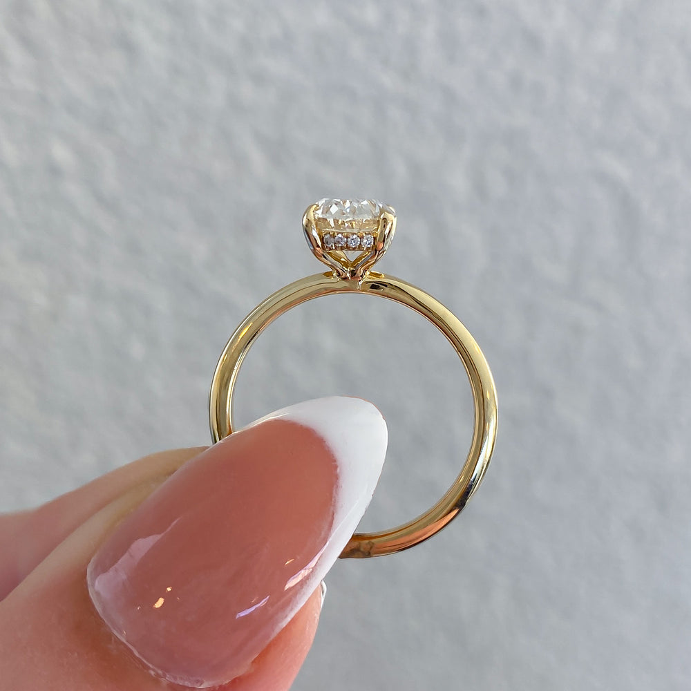 
                  
                    Azalea Natural Oval Diamond Hidden Halo Solitaire Engagement Ring, 1.30 CTTW - Carter's Collective Fine Jewelry
                  
                