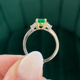 Emerald Three Stone Ring with Trapezoid Diamond Accent Stones