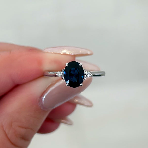 Platinum Oval Sapphire Diamond Accent Ring