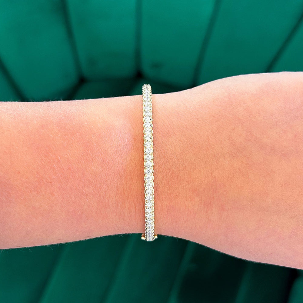 Illusion Set Diamond Bangle Bracelet, 0.65 CTTW - Carter's Collective Fine Jewelry