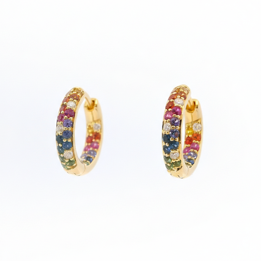 Gold hoop earrings with multicolored gemstones on a white background