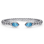 Sterling Silver Bujukan Bangle Bracelet with Pear Blue Topaz Gemstones - Carter's Collective Fine Jewelry