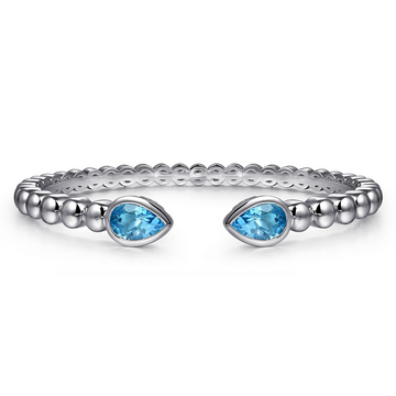 Sterling Silver Bujukan Bangle Bracelet with Pear Blue Topaz Gemstones - Carter's Collective Fine Jewelry