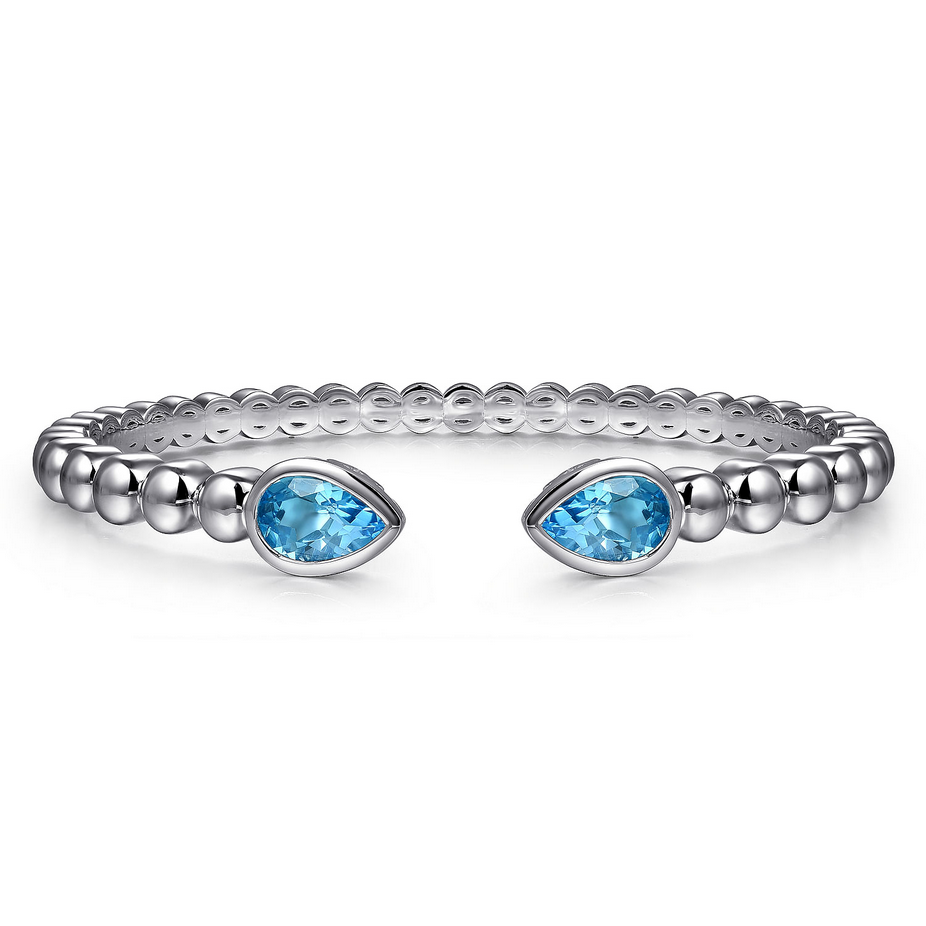 Sterling Silver Bujukan Bangle Bracelet with Pear Blue Topaz Gemstones - Carter's Collective Fine Jewelry