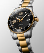 Longines "Hydroconquest" Watch - Stainless Steel with Yellow PVD & Black Polished Dial, 41mm - Carter's Collective Fine Jewelry