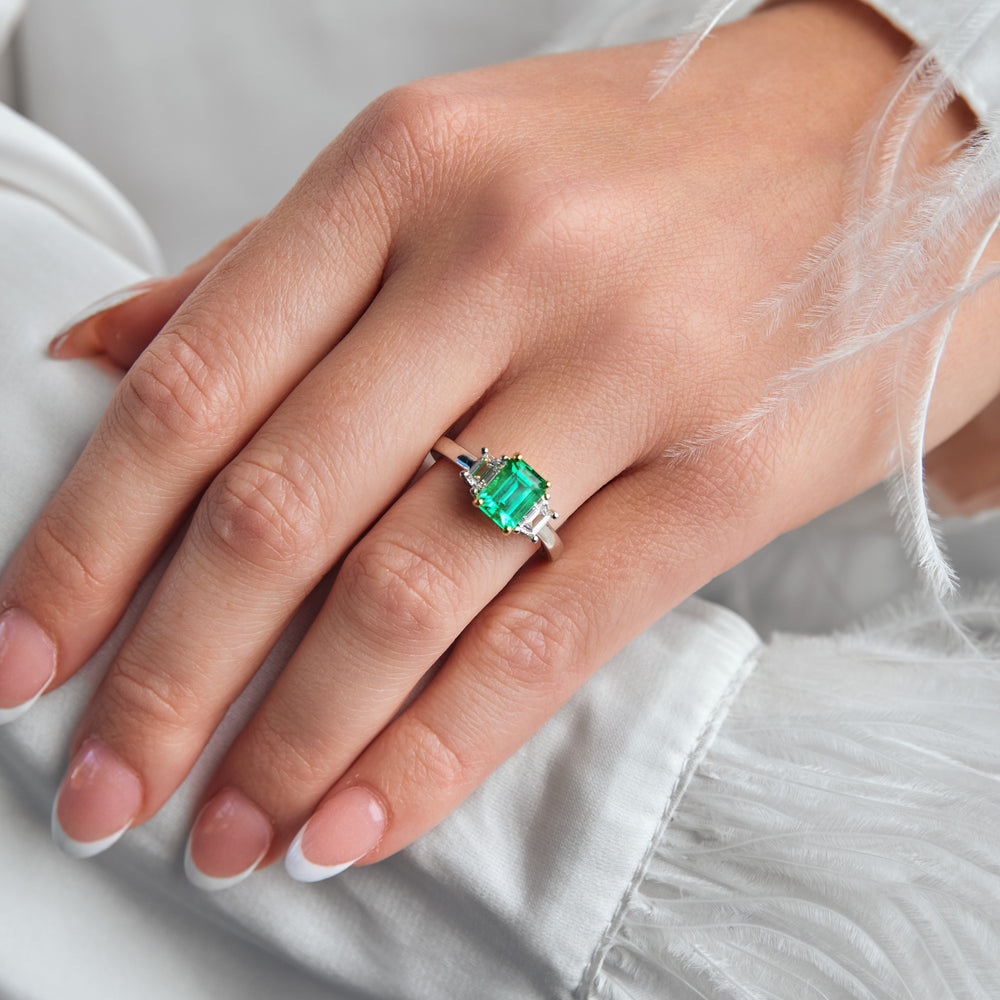 Emerald Three Stone Ring with Trapezoid Diamond Accent Stones